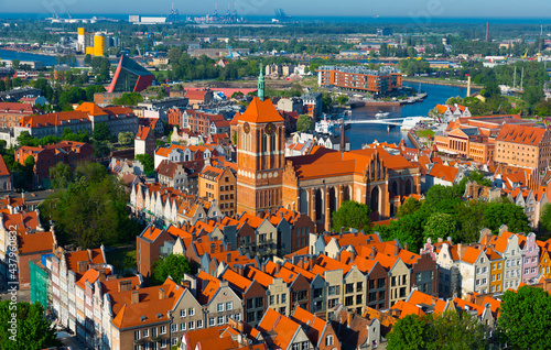 Aerial view of summer cityscape of Gdansk with tower of Gothic Church of St.John, Poland.