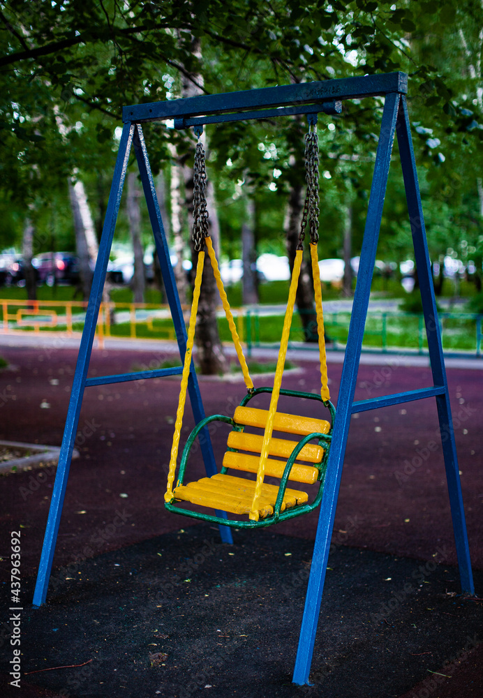 children's swing on the children's city playground children's swing on the children's city playground