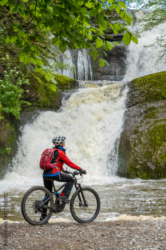 pretty woman with electric ...