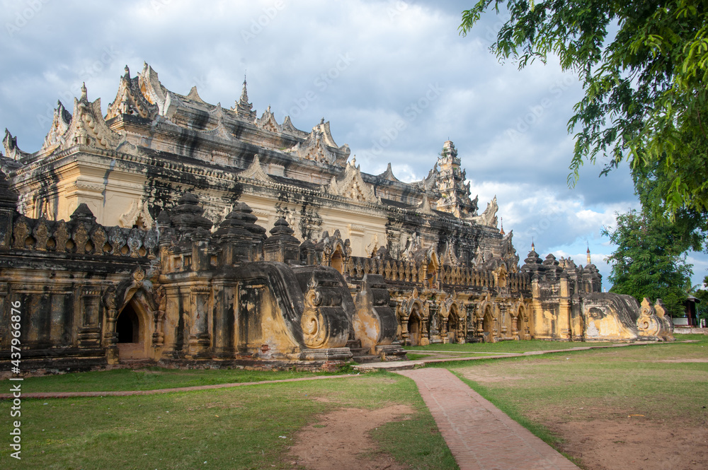 Ancient stone temple in Myanmar bathed in afternoon light in Myanmar