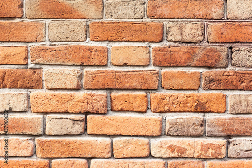 block background. old brick wall of red bricks.