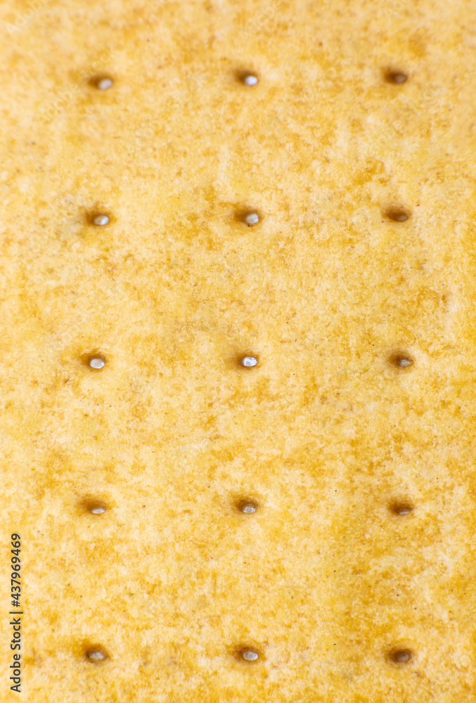 Roasted cookies texture background. Loaf Bakery concept. Close up, macro photo. Beautiful natural wallpaper.