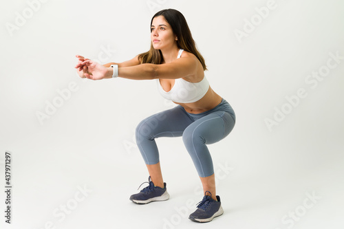 Healthy woman taking care of her fit body