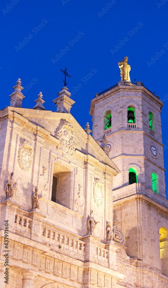 Blue hour. Facade of the Cathedral of Valladolid illuminated with colored artificial light.