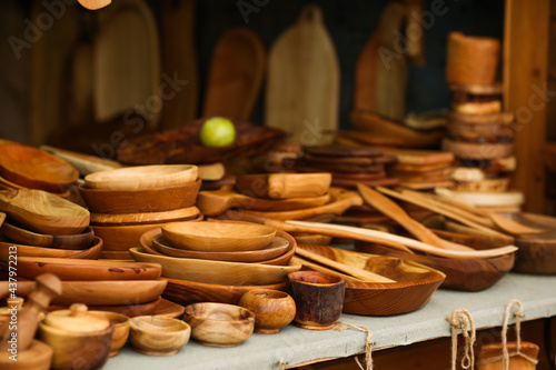 Still life of home kitchen utensils on a dark wooden background. Environmentally friendly dishes, ecology concept