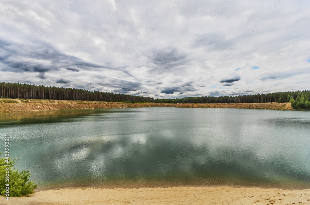 Obraz premium Water quarry on summer day