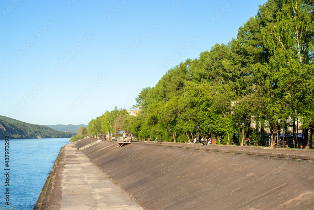 Concrete embankment of the river Yenisei in Divnogorsk, Russia