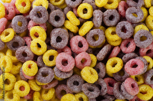 Multicolor cereals rings for breakfast as background