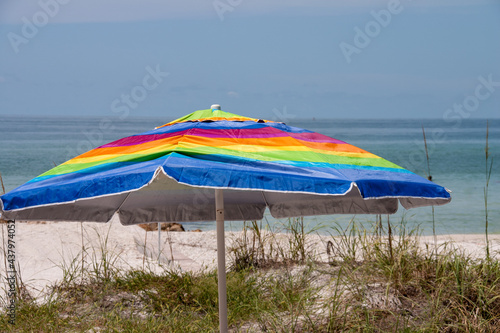 Colorful Umbrella at the beach on a sunny day