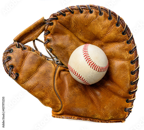 Photography A white leather baseball in a brown vintage, antique glove