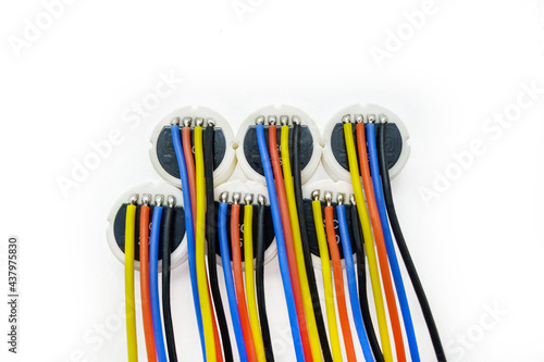 Group of pressure sensors arranged in conceptual way on white background