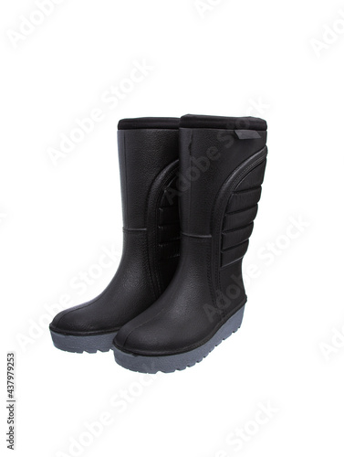 Shoes for bad weather. Warm rubber boots with tractor soles isolated on white back