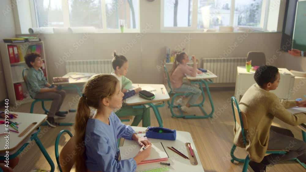 Children learning science in school class. Students having lesson in classroom Children learning science in school class. Students having lesson in classroom