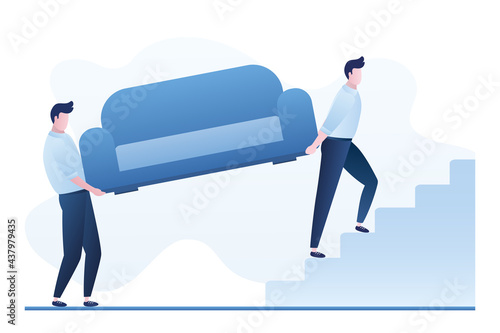 Movers carry sofa up stairs. Lifting heavy furniture into apartment. Delivery service, relocation. Man workers, loaders. Delivery of goods to buyer.