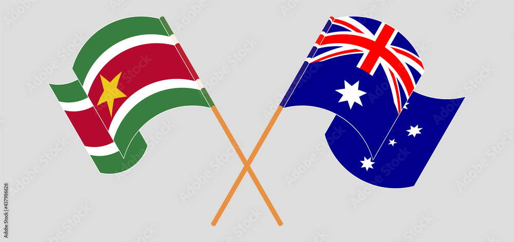 Crossed and waving flags of Suriname and Australia Crossed and waving flags of Suriname and Australia