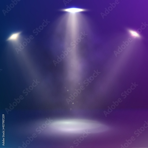 Beams of three spotlights illuminate the stage. Abstract scene background design with spotlights and smoke.