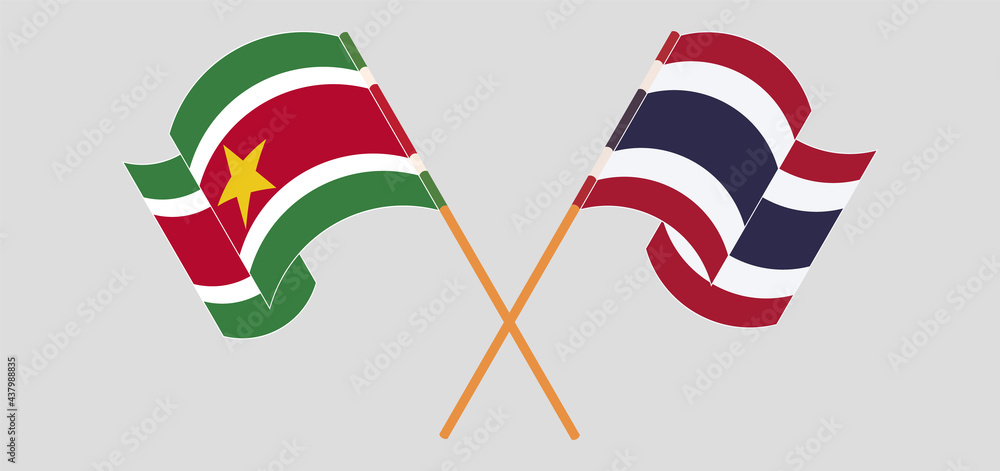Crossed and waving flags of Suriname and Thailand Crossed and waving flags of Suriname and Thailand