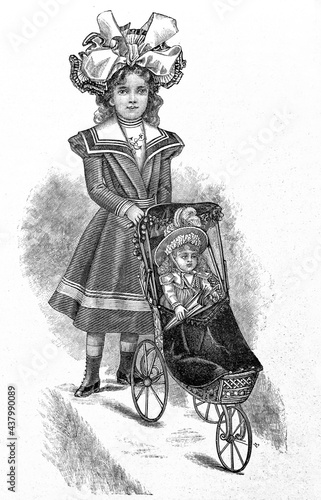 Little victorian girl wearing vintage dress engraved illustration doll photo