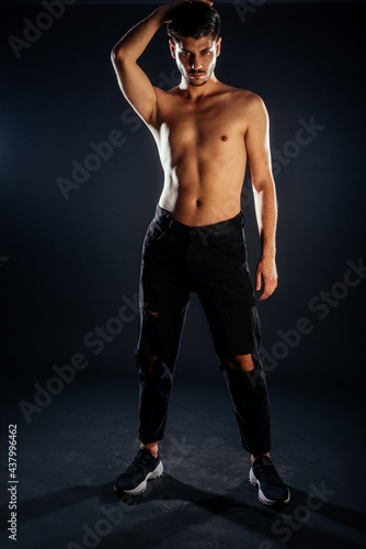 Young guy posing in studio