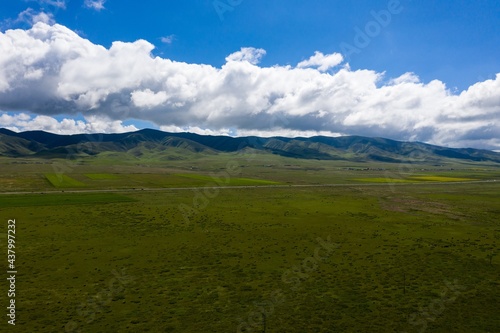 Clouds and mountains by Qinghai lake in summer