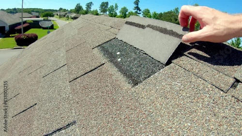 roof shingle damaged during wind storm