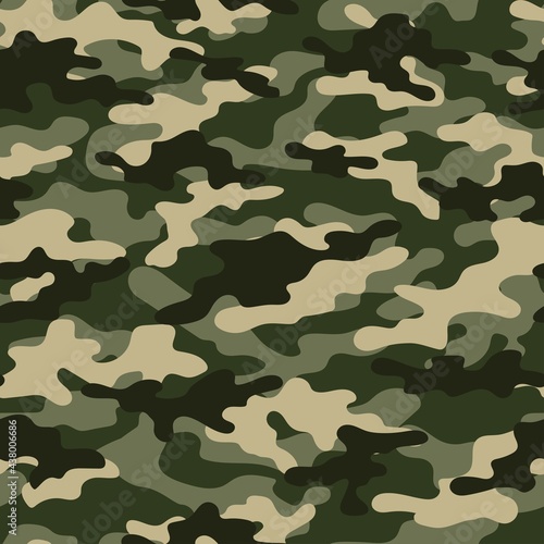 Seamless green camouflage pattern classic.Print on fabric on paper. Vector