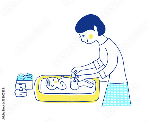 赤ちゃんのおむつ替えをするママ