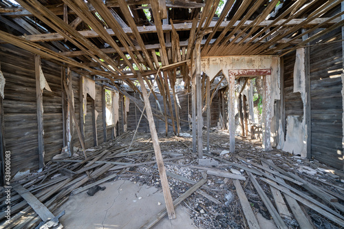 Interior of the completely damaged and abandoned former Glenrio Texas post office photo