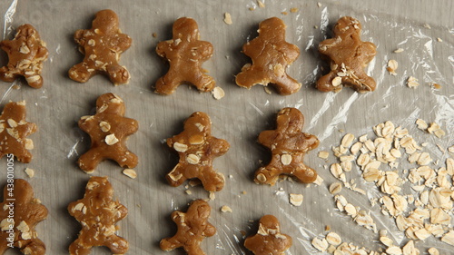 Ginger bread cookies homemade cooking for Christmas traditional dessert. Kids and family love to prepare to make dough and bake them. Then paint them with sugar paste to decor in many colors.