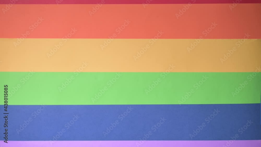 Hand fist with lgbt flag background. Lgbt pride concept. Gender equality concept. Pride flag with fist. Lgbt power concept Hand fist with lgbt flag background. Lgbt pride concept. Gender equality concept. Pride flag with fist. Lgbt power concept
