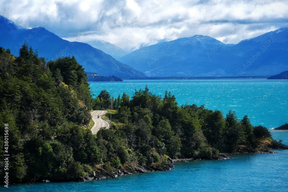 Cyclist's turquoise paradise
Solo cyclist on the Carretera Austral along the turquoise General Carrera lake, Patagonia, Chile