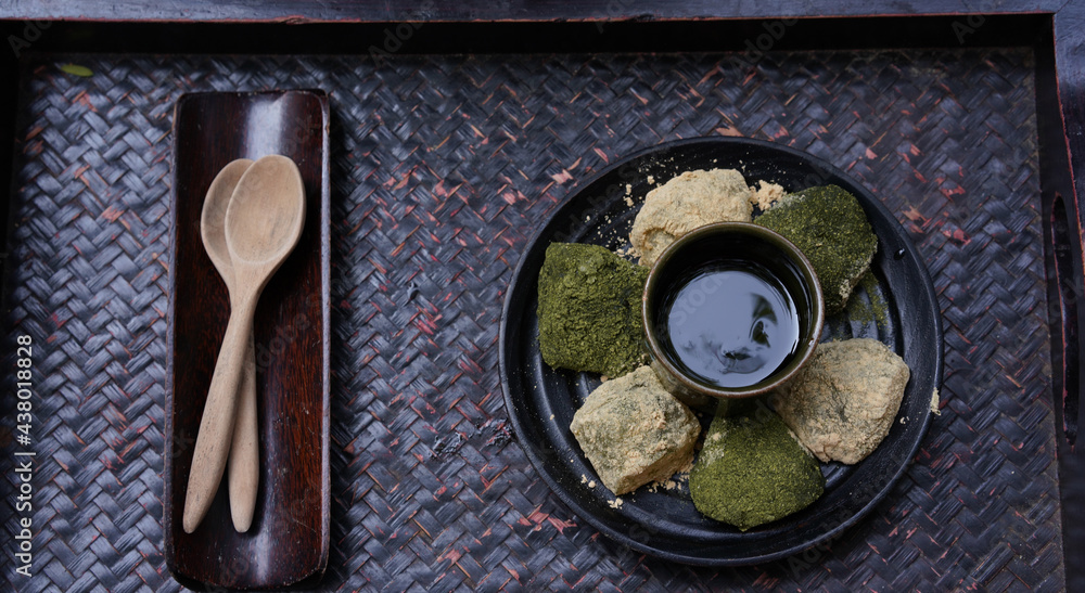 Warabi mochi, japanese soft glutinous rice with sweet sticky sauce for