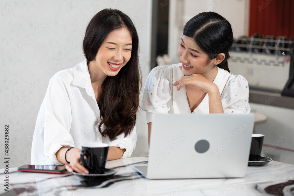 young couple woman talking and using laptop computer in free time young couple woman talking and using laptop computer in free time