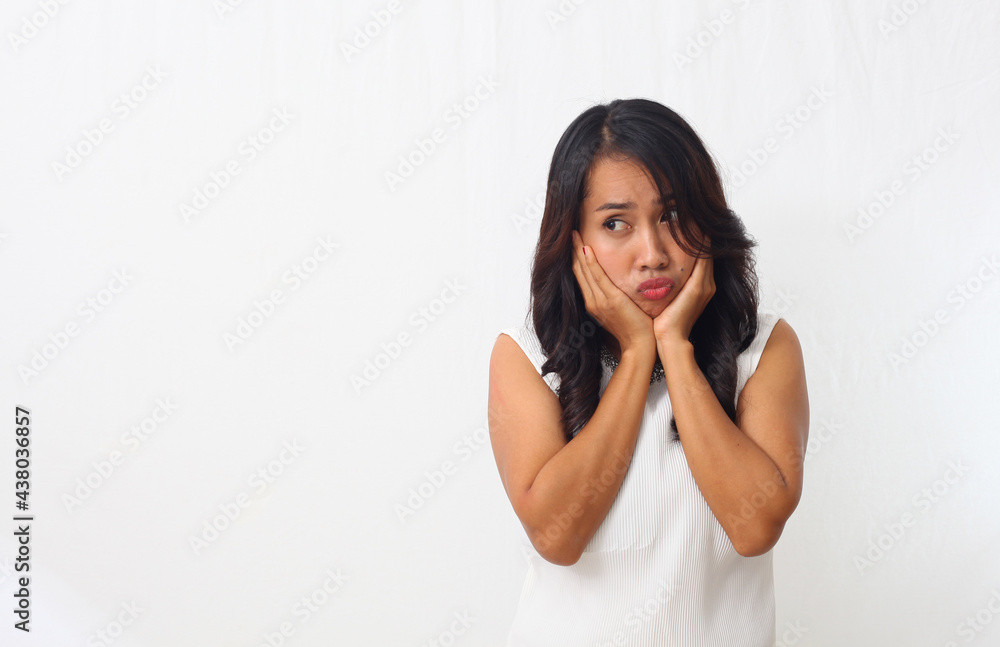 Asian woman with dreadlocks frowning her face having doubt and suspicion feeling Asian woman with dreadlocks frowning her face having doubt and suspicion feeling