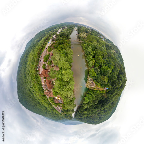 cloudy day at the end of spring near the M4-Don road (western Caucasus, southern Russia) over the mountain river Psekups, surrounded by low mountains overgrown with forest photo