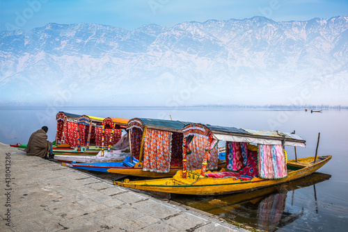 Beautiful view of the colorful Shikara boats floating on Dal Lake, Srinagar, Kashmir, India. photo