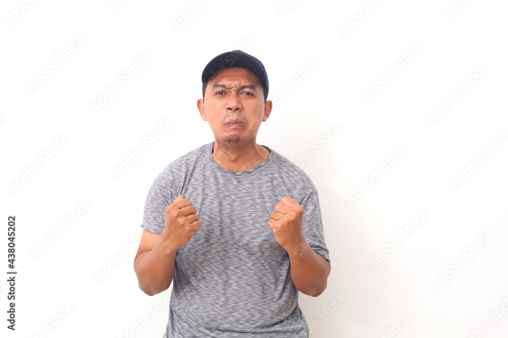 Portrait of Angry face of Asian man out of patient on white background Portrait of Angry face of Asian man out of patient on white background