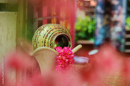 This picture shows the pot used for decoration and the flower inside it.