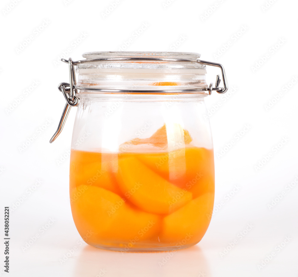 A bottle of canned yellow peache A bottle of canned yellow peache