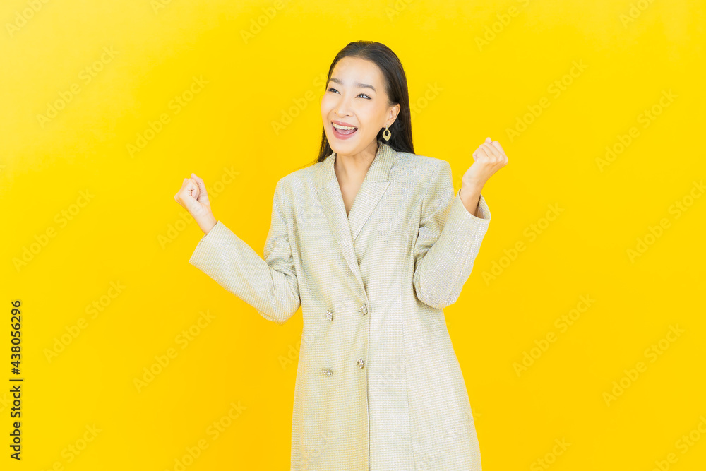 Portrait beautiful young asian woman smile with action Portrait beautiful young asian woman smile with action