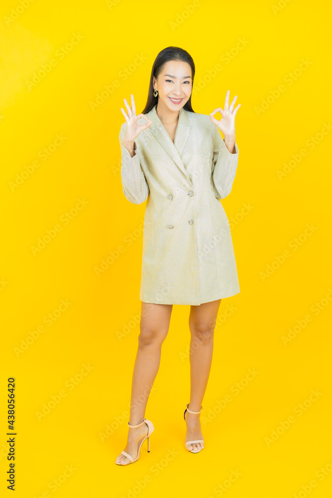 Portrait beautiful young asian woman smile with action Portrait beautiful young asian woman smile with action