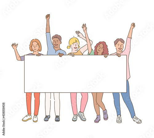 Young people are holding a white board and cheering with one hand raised. hand drawn style vector design illustrations. 