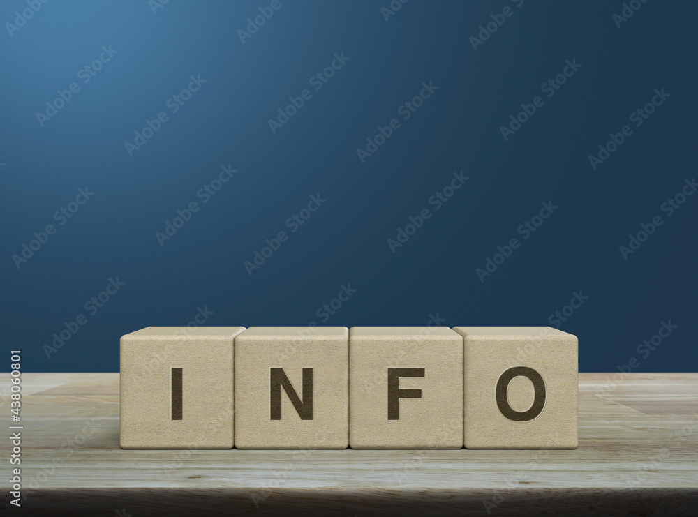 Info letter on block cubes on wooden table over light blue gradient background, Business customer service and support concept Info letter on block cubes on wooden table over light blue gradient background, Business customer service and support concept