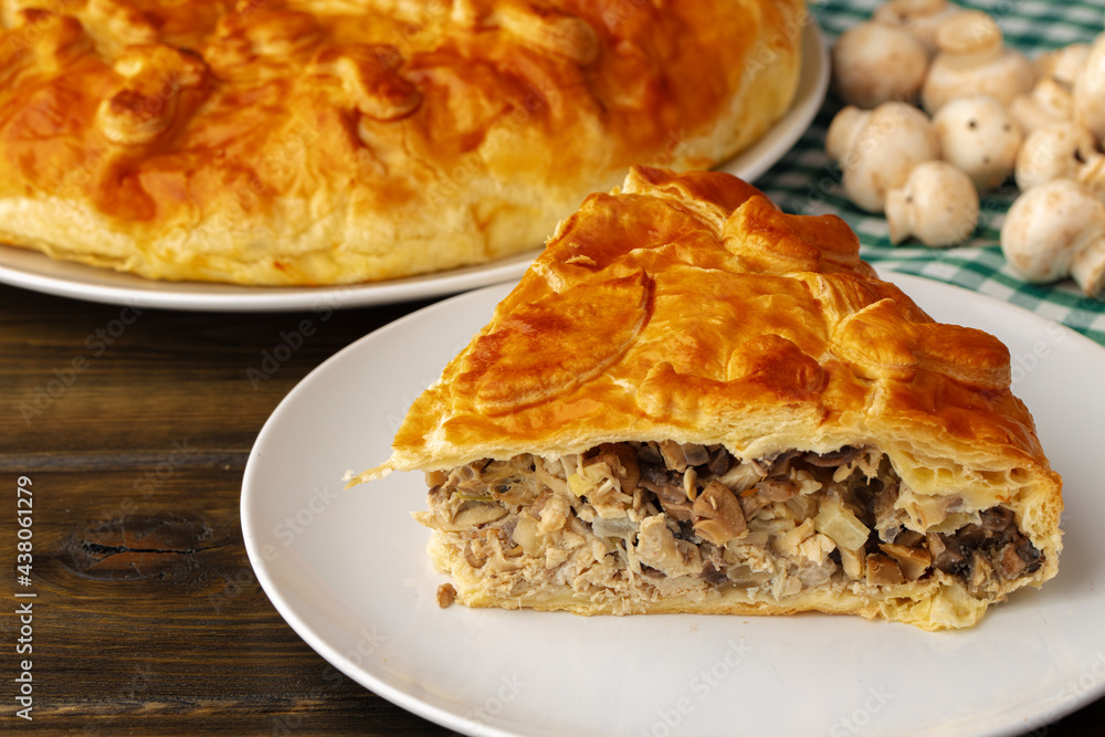 Fresh meat pie on served on wooden table Fresh meat pie on served on wooden table