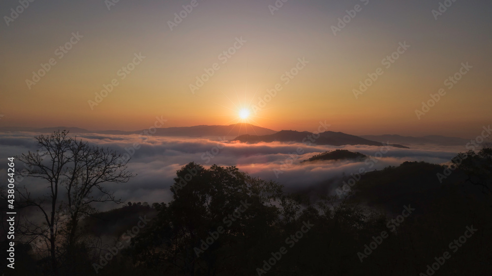 Beautiful sunshine at misty morning mountains at north thailand