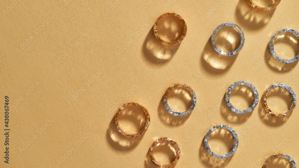 Collection of clear acrylic rings lying falt Collection of clear acrylic rings lying falt