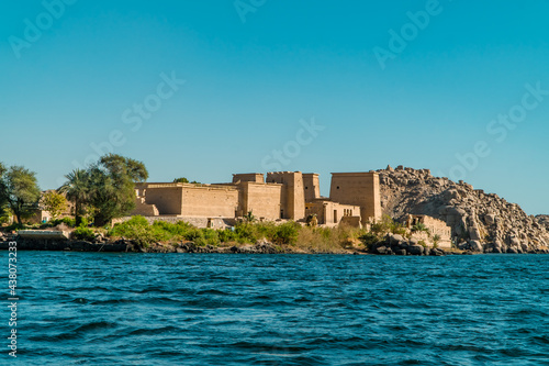 Fototapeta Naklejka Na Ścianę i Meble -  Panorama view of the Temple of Isis on Agilkia Island (formerly Philae) in the reservoir of the Aswan Low Dam in Agilkia, Egypt
