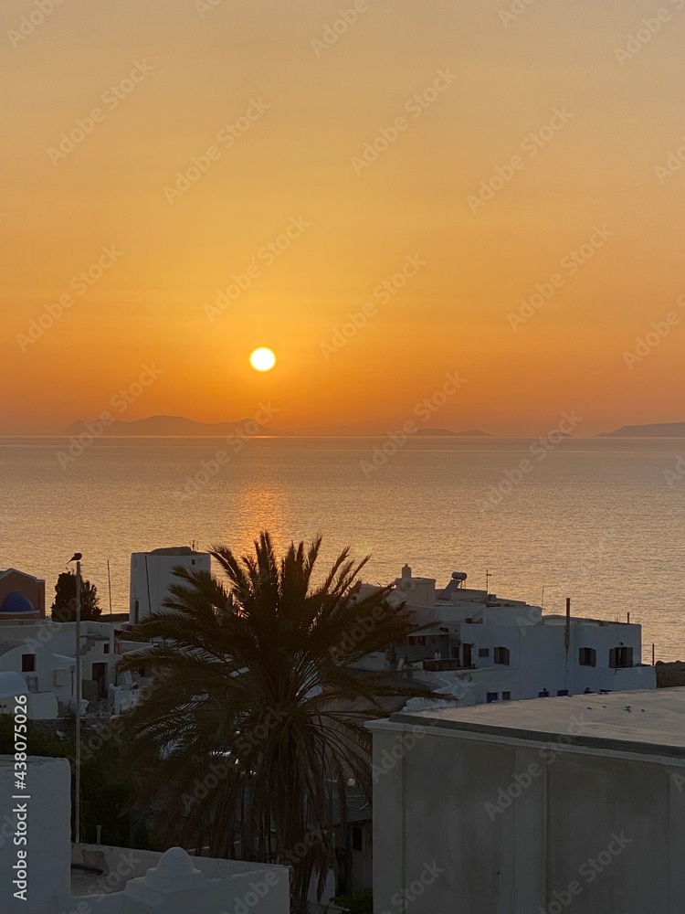 Fototapeta premium sunset on Santorini, view from hotel balcony, Oia sunset