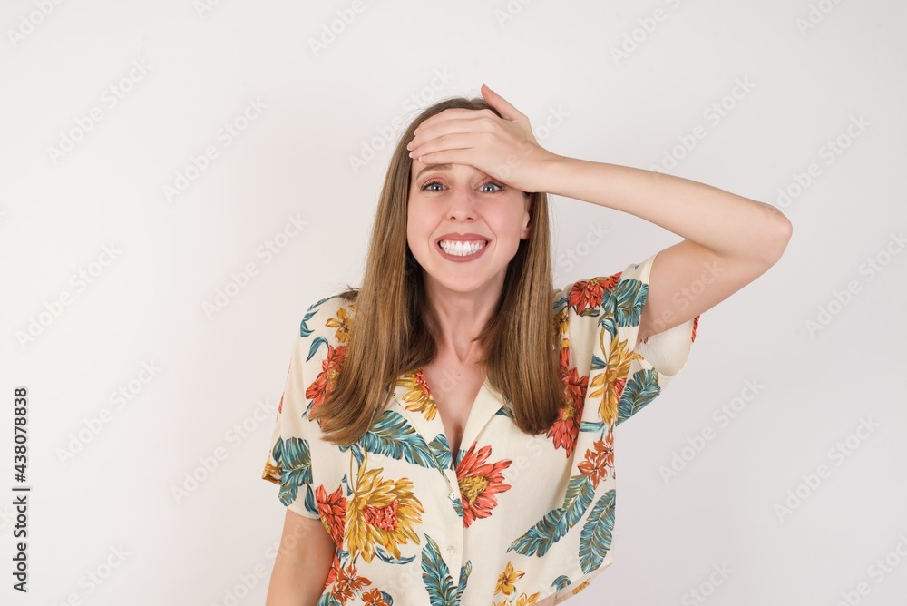 Oops, what did I do? Beautiful blonde woman holding hand on forehead with frightened and regret expression. Wearing casual clothes standing outdoors. Oops, what did I do? Beautiful blonde woman holding hand on forehead with frightened and regret expression. Wearing casual clothes standing outdoors.