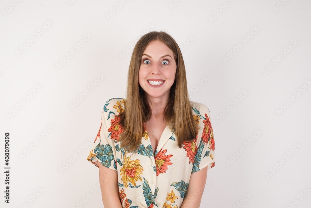 Young beautiful girl with an afro hairstyle having broad white smile being excited to meet Friends and go out to have a good day. Young beautiful girl with an afro hairstyle having broad white smile being excited to meet Friends and go out to have a good day.